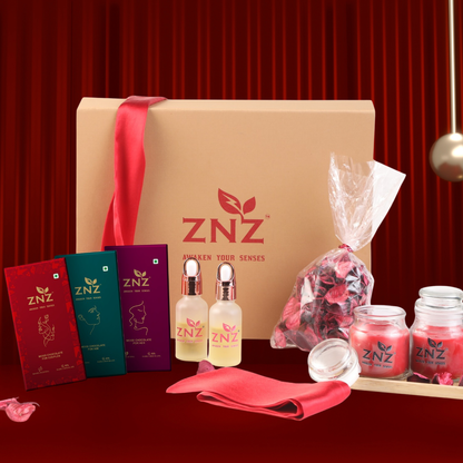 znz romance gift hamper for couples mood . includes mood uplifting chocolate for couples, mood uplifting chocolate for men, mood uplifting chocolate for women, a satin blindfold, a scented candle, a massage oil and scented flowers for special evenings.